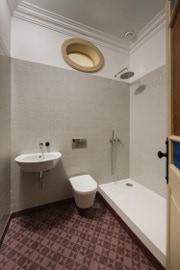 mosaico hidráulico da Projecto Mosaico ref Estrela 2C no piso duma casa de banho projectada pela arquitecta Marta Campos