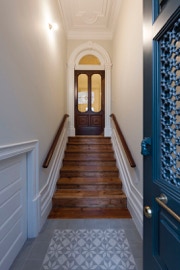 mosaico hidráulico padrão Noruega B aplicado no piso de um hall de entrada no Porto